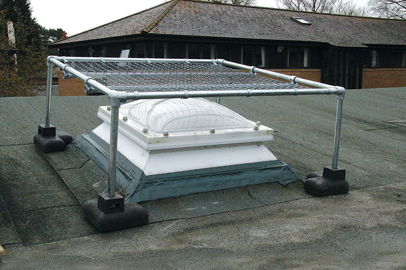Modular cover made from tube and mesh over a raised rooflight